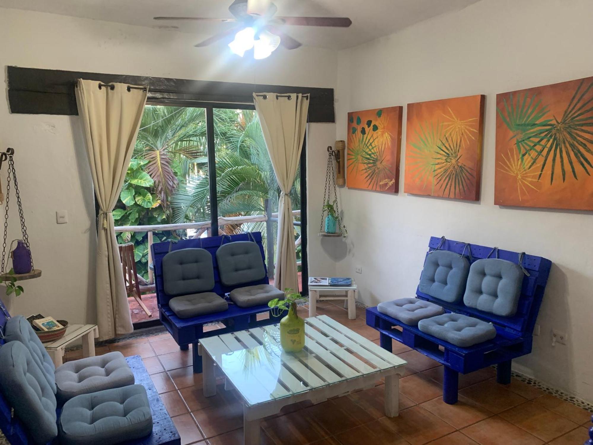 Casa Caribe Cancún Exterior foto Living room with a view of the ocean