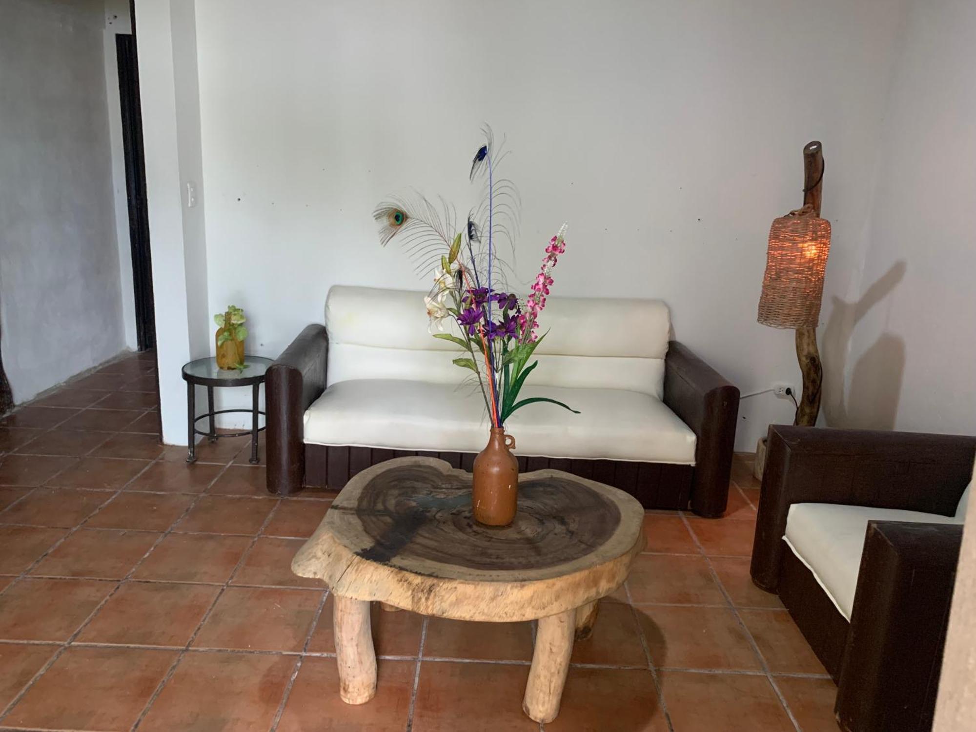 Casa Caribe Cancún Exterior foto A living room in a typical house in the community